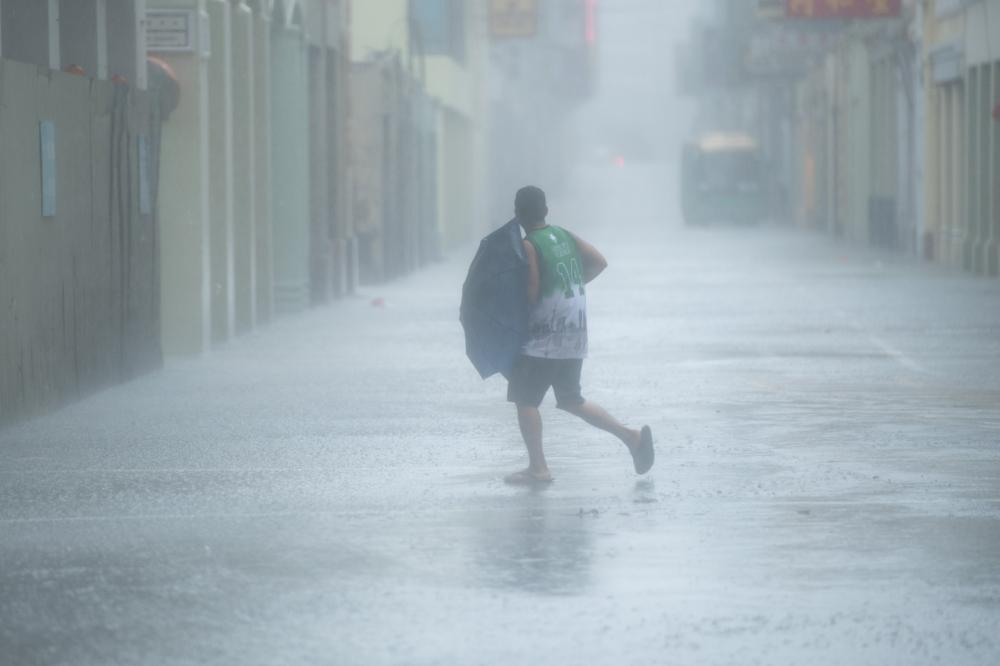 The Weekend Leader - China on alert for typhoon, geological disasters